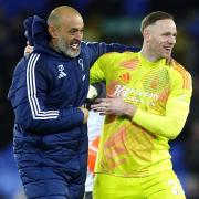 Nuno Espirito Santo celebrates with goalkeeper Matz Sels (Peter Byrne/PA)