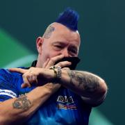 Peter Wright fought back the tears after upsetting world champion Luke Humphries (Bradley Collyer/PA)