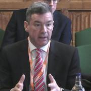 Lawrence Gosden was questioned at an inquiry in Parliament today, where he defended taking a six figure bonus.