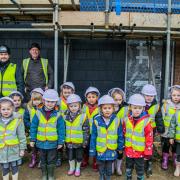 The pupils visited the site of eight affordable homes being built in Curdridge village