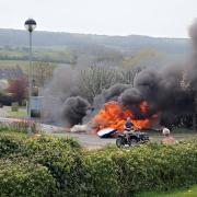 The plane quickly became a fireball, as a member of the park's staff fled the scene on a quad bike.