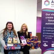 Nikita Watson from AECOM and Danielle Baird with easter egg donation.