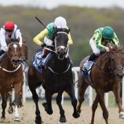 Salamanca (white hat) holds on well (Richard Sellers/PA)