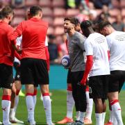 Adam Lallana talking to Southampton players ahead of their Premier League game against Fulham.