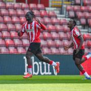 Joachim Kayi Sanda celebrates restoring Southampton's lead at St Mary's.
