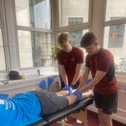 Students treated runners at the London Marathon