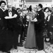 VE Day celebrations 8th May 1945 at the end of the Second World War. The Mayor of Southampton, J.C. Dyas, danced with Mrs R.J. Stranger, while the Mayoress dances with Councillor R.J. Stranger during the VE-Day celebrations on the forecourt of the Civic