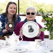 Commemorative plates feature names and rare WWII-era photographs