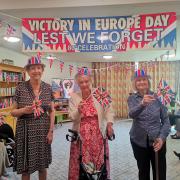 From left: Residents Margaret Jarman, April Nye and Joyce Ponsonby celebrate the VE Day anniversary at Colten Care’s Kingfishers in New Milton, Hampshire