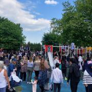 Many residents gathered to let their children try the new equipment