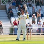 Nottinghamshire's Liam Patterson-White celebrates completing his first century at Trent Bridge on day three of the Rothesay County Championship match against Hampshire