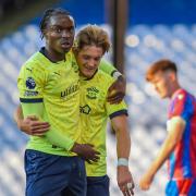 Match winners Derrick Abu and Dom Ballard celebrate victory in the Premier League 2 play-offs semi-final