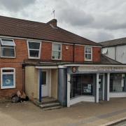 A new three-storey development featuring 12 flats and two shops could replace an existing building in Totton's town centre