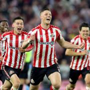 Dan Ballard and team-mates celebrate his winning goal (Steve Welsh/PA)