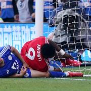 Taiwo Awoniyi (right) has been placed in an induced coma following an injury suffered against Leicester (Jacob King/PA)