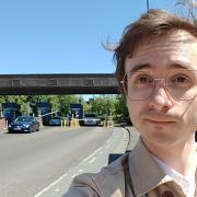 Reporter Cristiano outside the toll gate of the Itchen Bridge