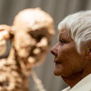 Dame Judi Dench sits for sculptor Frances Segelman in front of an audience at Claridge’s in London (Jordan Pettitt/PA)