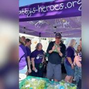 Josh Harnett at the Abby's Heroes stall at Alresford Watercress Festival