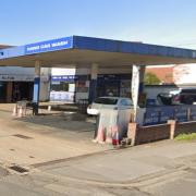 Plans to turn a garage into a Tesco Express convenience store have sparked more than 80 objections
