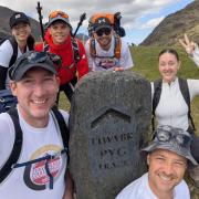 Romsey School staff celebrate summit of Snowdon during charity trek
