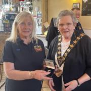 Rose Timms being presented her award by the Mayor of Eastleigh Councillor Janice Asman.