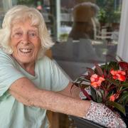Hands-on gardening brings smiles to Memory Lane residents