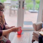 Antiques expert Karen Dalmeny evaluates heirlooms at Snowdrop Place Care Home