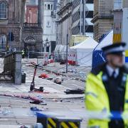 A man has been arrested on suspicion of attempted murder, dangerous driving and drug driving after a car allegedly ploughed into pedestrians at Liverpool’s victory parade (Peter Byrne/PA)