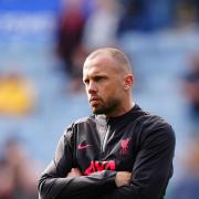 Liverpool assistant coach John Heitinga is a contender for the Ajax job (Mike Egerton/PA)