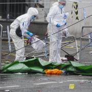 Forensic officers at work at the scene in Water Street, Liverpool (Peter Byrne/PA)