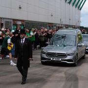 The hearse of Sir Tom Farmer was driven past Easter Road (Andrew Milligan/PA)