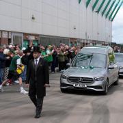 The hearse of Sir Tom Farmer was driven past Easter Road (Andrew Milligan/PA)