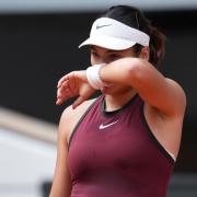 Emma Raducanu was well beaten by Iga Swiatek (Christophe Ena/AP)