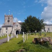 Church presides over the village