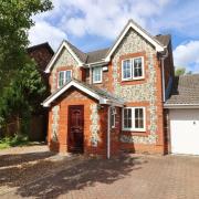 Attractive four-bedroom detached home with driveway parking