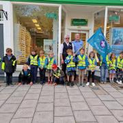 Youngsters don hi-vis vests after eye-care session at Lymington store