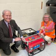 Sir Julian Lewis MP tours New Forest charity sending 650th generator to Ukraine