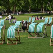 People enjoying the warm weather in London's St James's Park on the first day of the Meteorological summer (June 1)