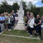 Nurses from Michigan lay flowers at Nightingale’s grave in Wellow