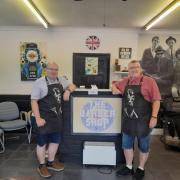Rob Barbour (left) and Bandy Smith (right), inside The Barber Shop
