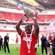 Charlton Athletic's Thierry Small with the trophy after winning the Sky Bet League One play off final at Wembley