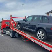 A black Porsche Cayenne was seized after the driver was found to not have a 'full licence'.