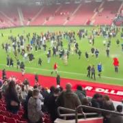 A pitch invasion at St Mary's Stadium following a charity match on Saturday, June 7