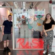 Daniel Farmer and Holly Tritton outside the shop