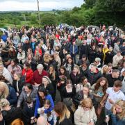 People attend a vigil at the Glenskirlie Hotel in Banknock, for Cole Cooper (Robert Perry/PA Wire)