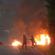 Fires burning in Portadown in Co Armagh, following three nights of disorder in Ballymena, Co Antrim (Brian Lawless/PA)