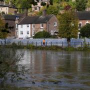 Flood defences were put in place along the wharfage next to the River Severn at Ironbridge in Telford in October last year (Nick Potts/PA)
