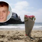 A floral tribute was left on the beach following the deaths of Joe Abbess,17, and 12-year-old Sunnah Khan in 2023