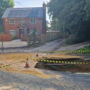 Sue Knight's photo of the hole after Southern Water works had been on site digging.
