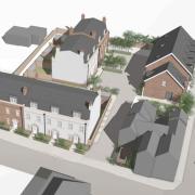 Plans to build homes on a former Jewson site in Lymington have run into opposition